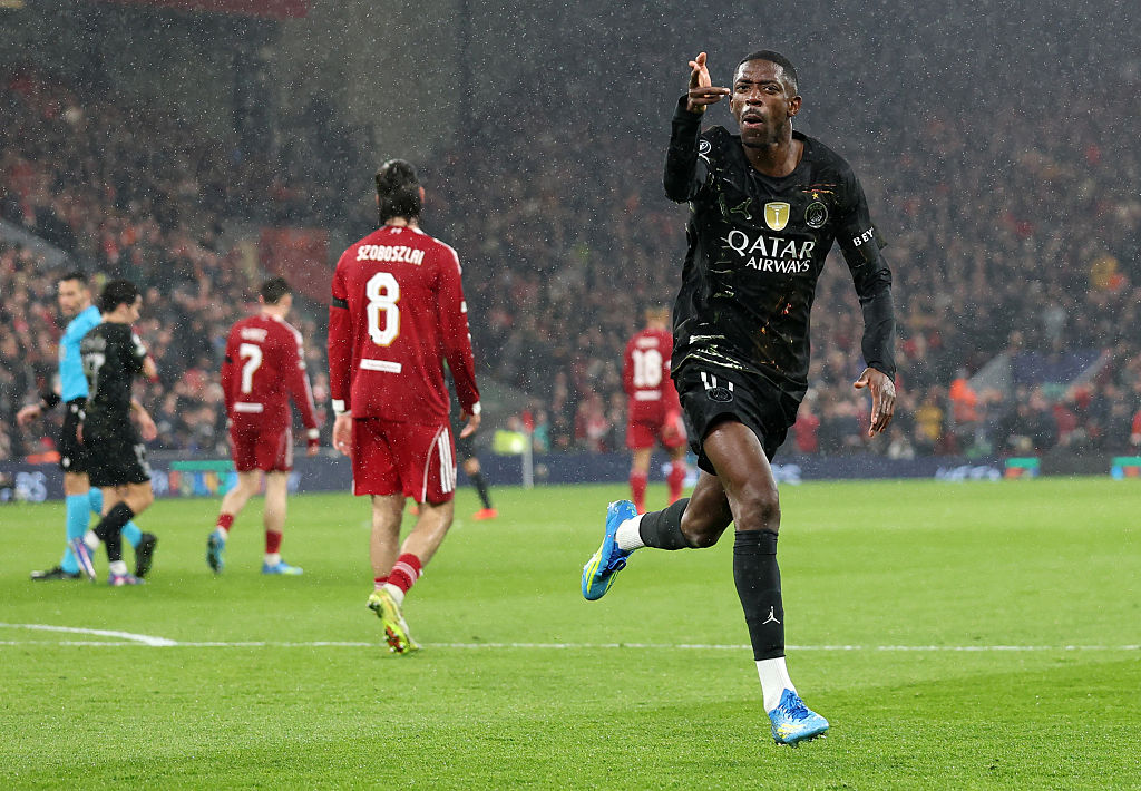 Ousmane Dembele of Paris Saint-Germain celebrates scoring against Liverpool