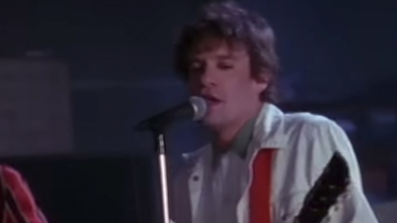 Paul Westerberg singing into a microphone