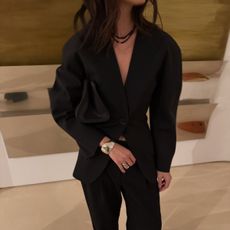 Mimi wearing COS blazer.