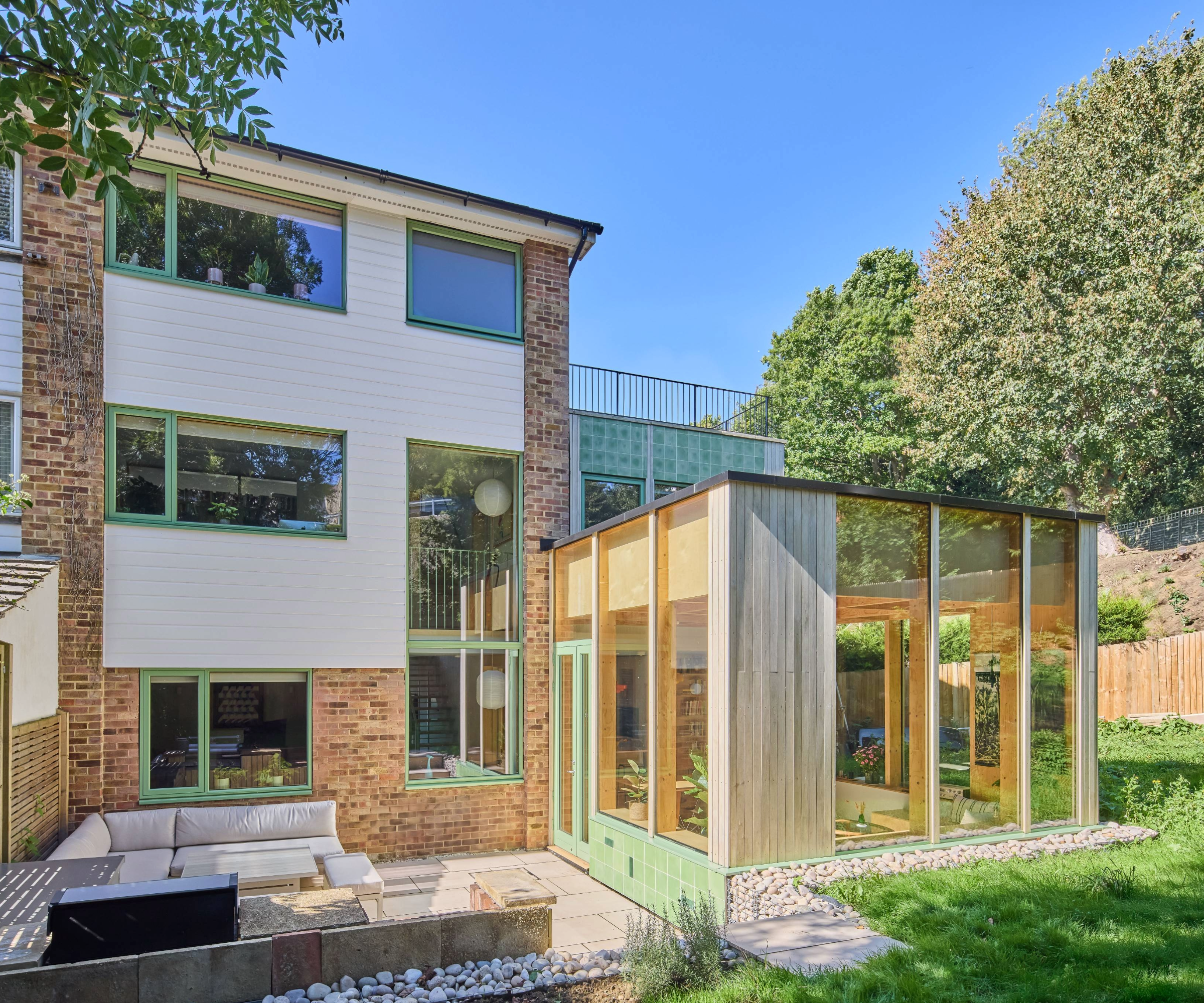 Extension on house with green details