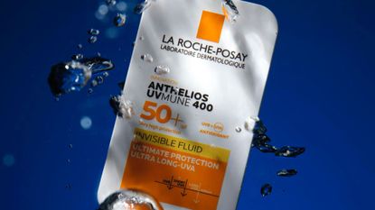 A sachet of sunscreen immersed in water