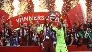 How to watch Leicester City in the Premier League - Leicester City raise the FA Cup in celebration of the win in May 2021.