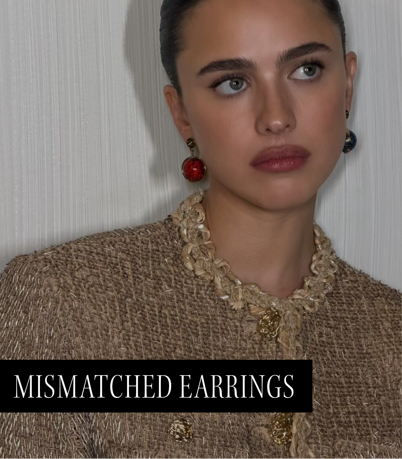 A photo of Margaret Qualley wearing mismatched earrings, one of the top 2026 micro trends.