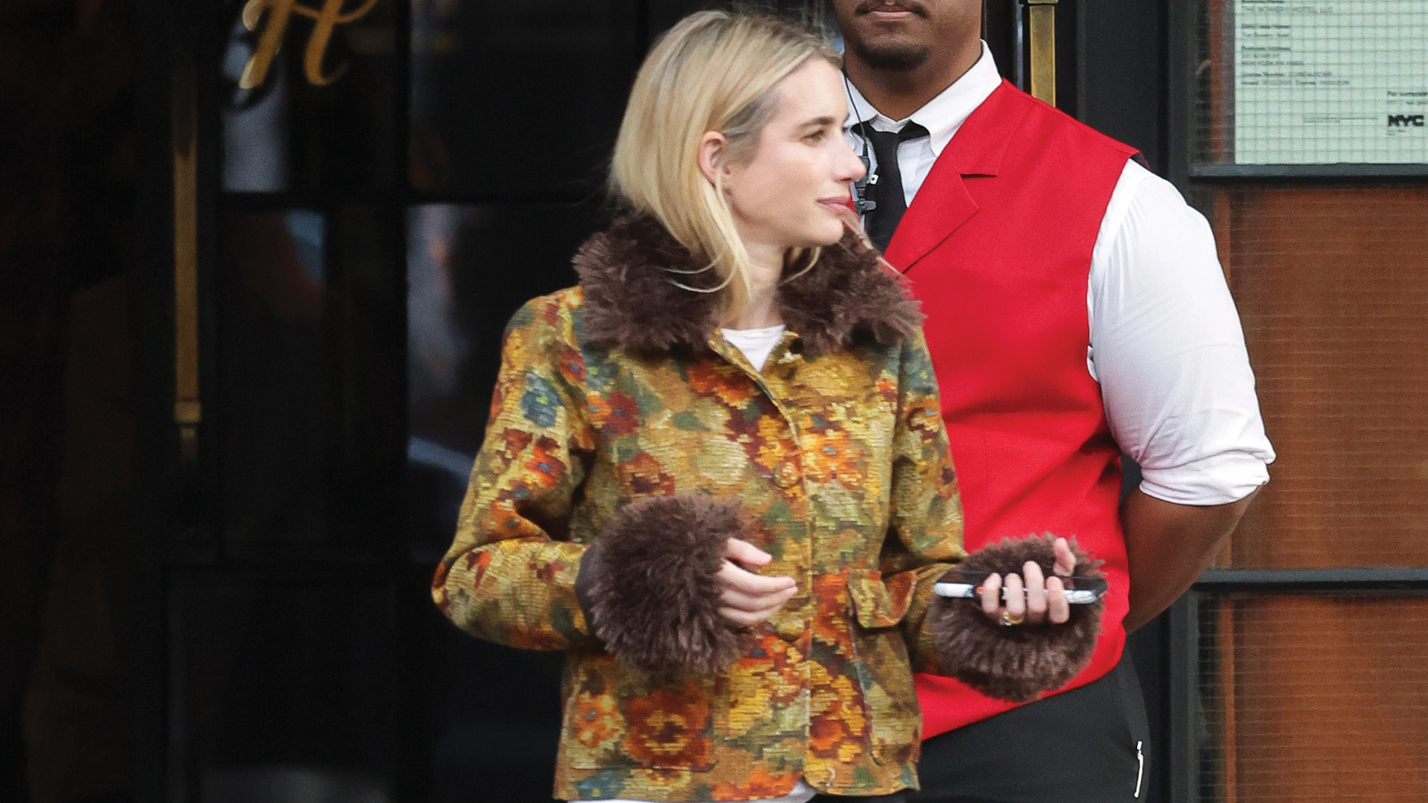 Avoid Looking Dated in Black Jeans and Flat Boots by Adding This Specific Jacket Trend