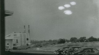 On July 16, 1952, Coast Guard seaman Shell Alpert took this photo of four roughly elliptical blobs of light in formation through the window of his photographic laboratory near Salem, Massachusetts. The U.S. Air Force's UFO task force, Project Blue Book, investigated the image and deemed it 