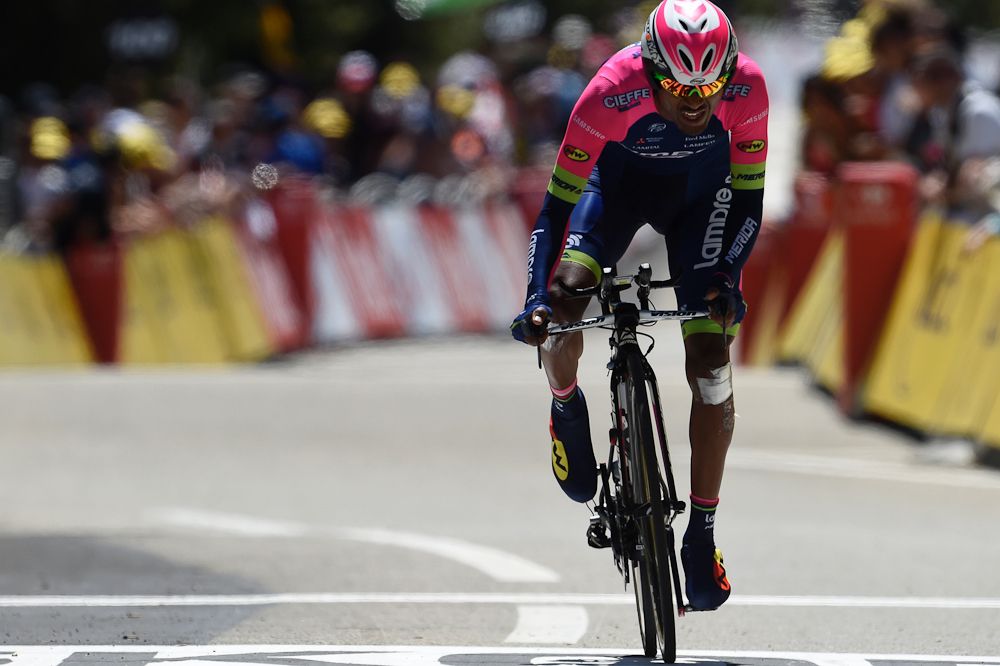 Tsgabu Grmay crosses the finish line during the stage 13 time trial.