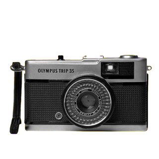 Olympus Trip 35 film camera on a white background