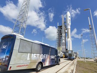 A United Launch Alliance Atlas V rocket topped with the AEHF-6 military communications satellite stands at the launch pad ahead of a planned March 26, 2020 liftoff.