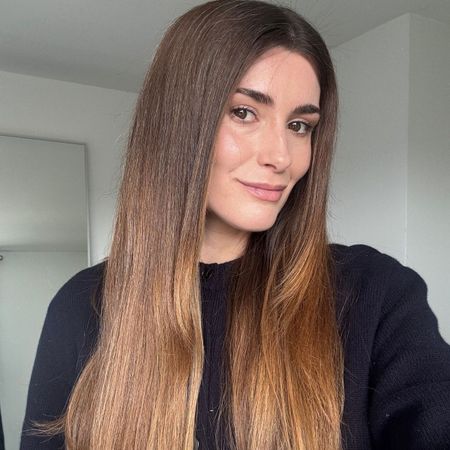 A selfie of Eleanor with straight hair