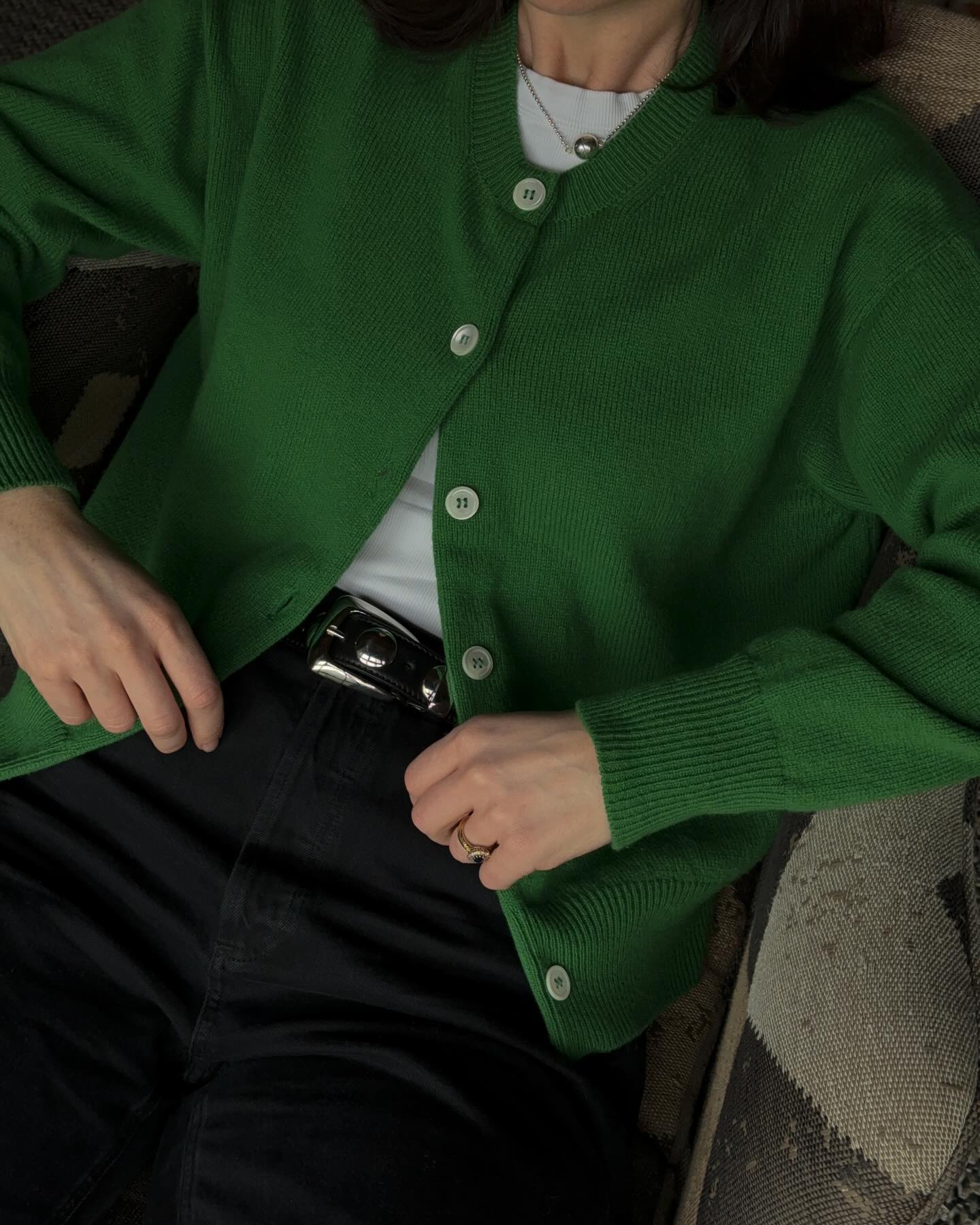 Influencer styles &Daughter's green Ada Geelong cardigan.