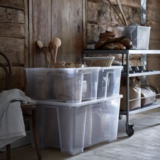 Clear plastic boxes used for shed storage