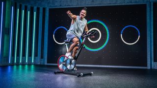 Fiit_Trainer_Gus vaz Tostes riding the Keiser M3i bike