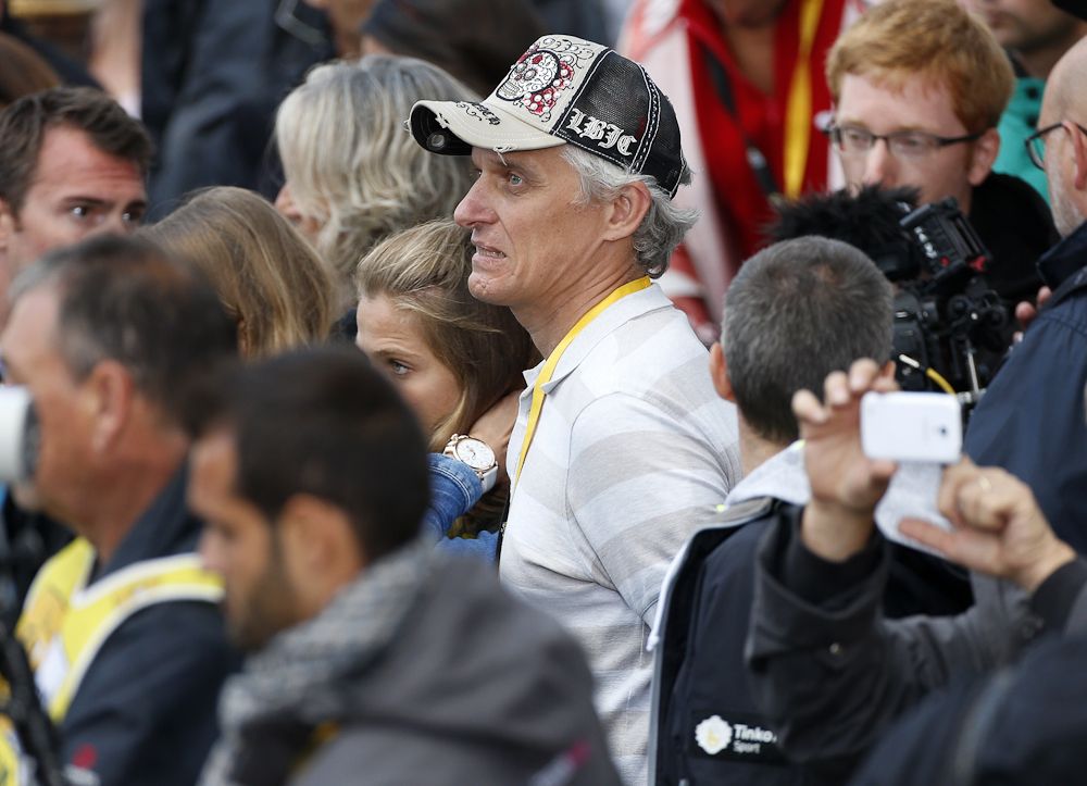 Oleg Tinkov, owner of Team Tinkoff-Saxo, looks on during the trophy ceremony following stage 21 of the 2015 Tour de France