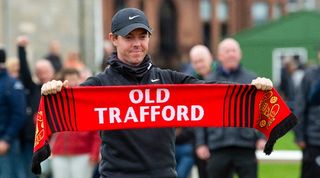 Golfer Rory McIlroy with a Manchester United scarf in 2019.