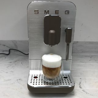 smeg bean to cup coffee machine on countertop