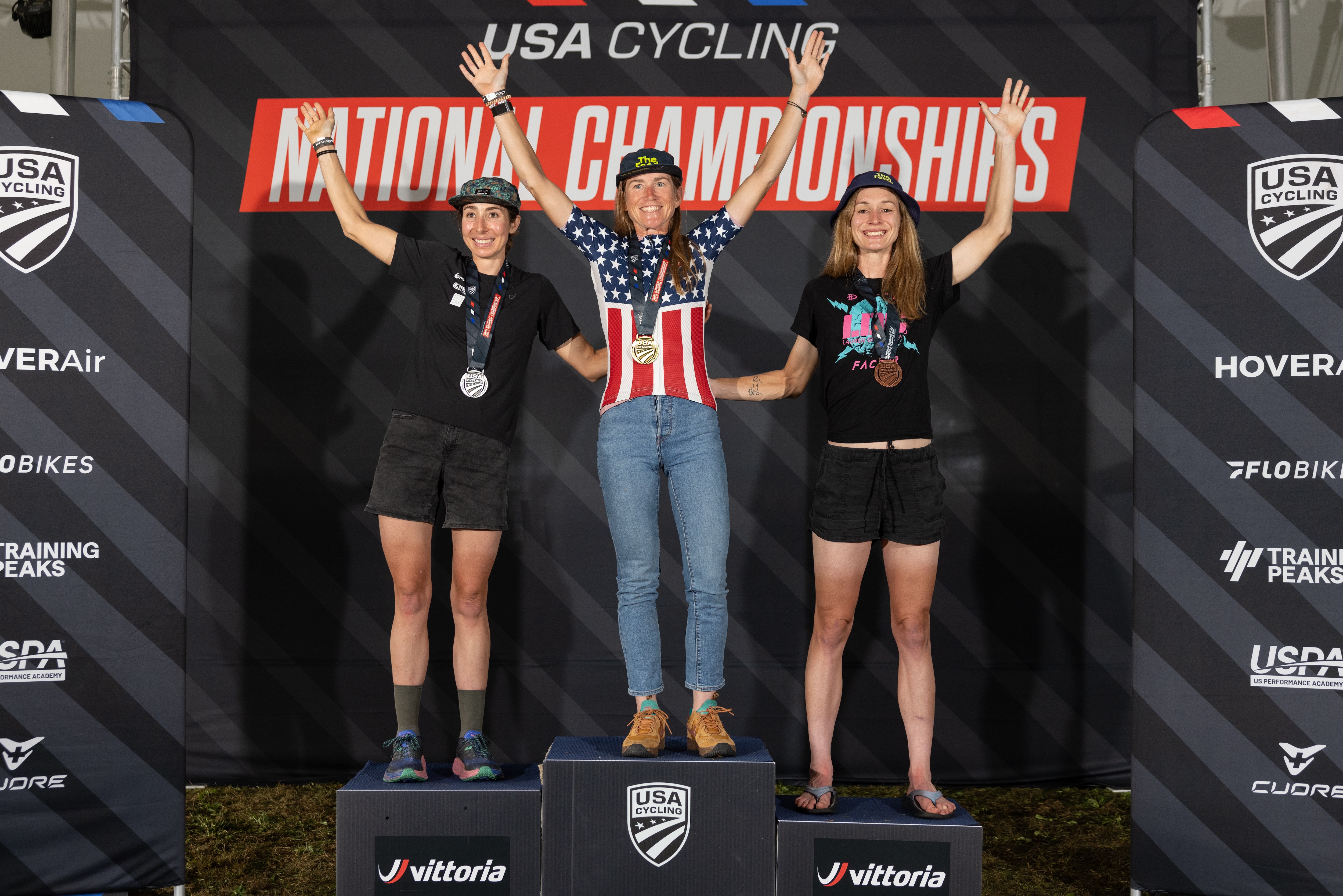 Elite women&#039;s podium at 2025 USA Cycling Gravel National Championships in Le Crescent, Minnesota (L to R): Sarah Lange second, winner Lauren Stephens and Lauren De Crescenzo third