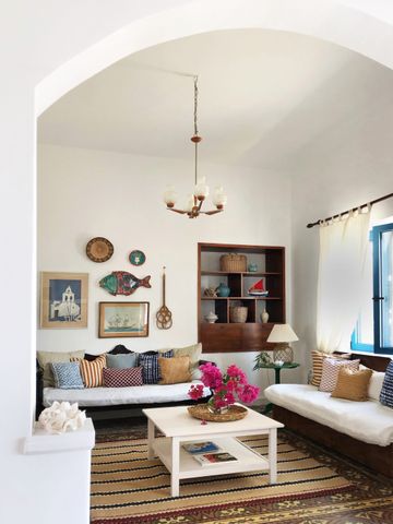 Explore a charming Greek villa that's had a colorful update to its ...