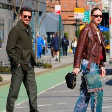 Bradley Cooper and Gigi Hadid crossing a New York City street in February 2024