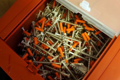 Indiana governor announces needle exchange program after declaring HIV public health emergency