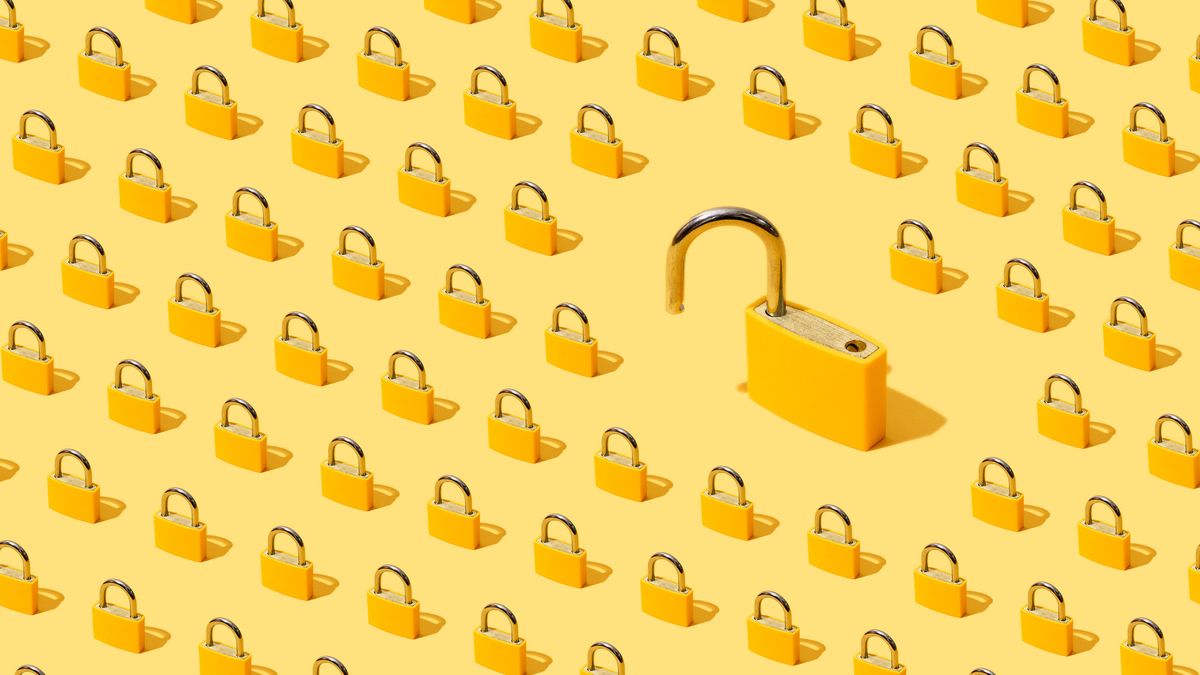 A graphic of dozens of locked, gold padlocks on a pale yellow background, lined up in rows and viewed with an isometric view to represent cyber security. To the right of the frame there is one especially large, unlocked padlock. They are set against a pale yellow background.