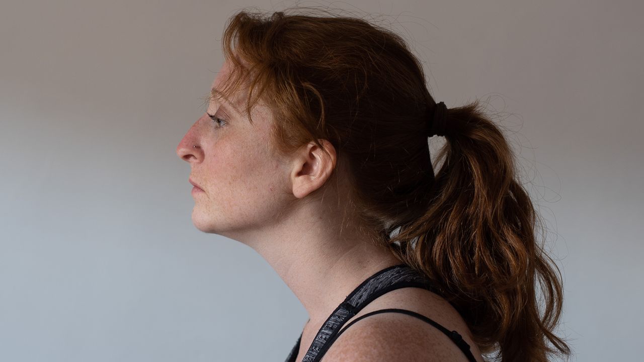 desk exercises: woman with chin pushed forward