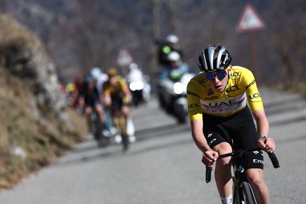 UAE Team Emirates Slovenian rider Tadej Pogacar R wearing the overall leaders yellow jersey cycles leading the race in the final kilometers of the 7th stage of the 81st Paris Nice cycling race 143 km between Nice and Col de la Couillole near Col de la Couillole southeastern France on March 11 2023 Photo by AnneChristine POUJOULAT AFP Photo by ANNECHRISTINE POUJOULATAFP via Getty Images