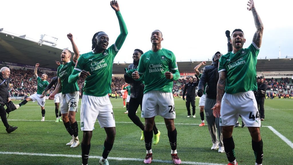 Malachi Boateng, Muhamed Tijani and Victor Palsson of Plymouth Argyle celebrate victory during the Emirates FA Cup Fourth Round match between Plymouth Argyle and Liverpool at Home Park on February 9, 2025 in Plymouth, England.