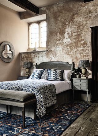 rustic vogue trend in a bedroom with beams and original features