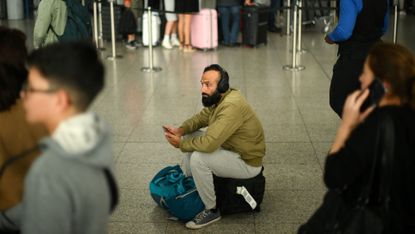 A passenger at Stansted Airport, 29 August 2023