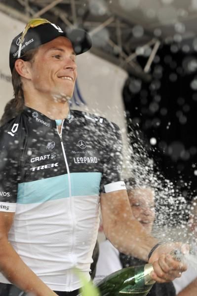 Linus Gerdemann (Leopard Trek) lets loose with the bubbly.