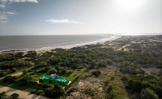 green artist house Casa Neptuna set in the uruguay landscape inland from a beach