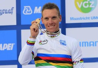 Philippe Gilbert (Belgium) shows off his gold medal
