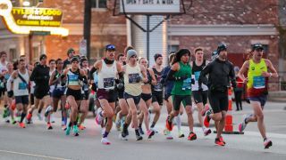 Runners in the 2022 Chevron Houston Marathon run along Washington Avenue