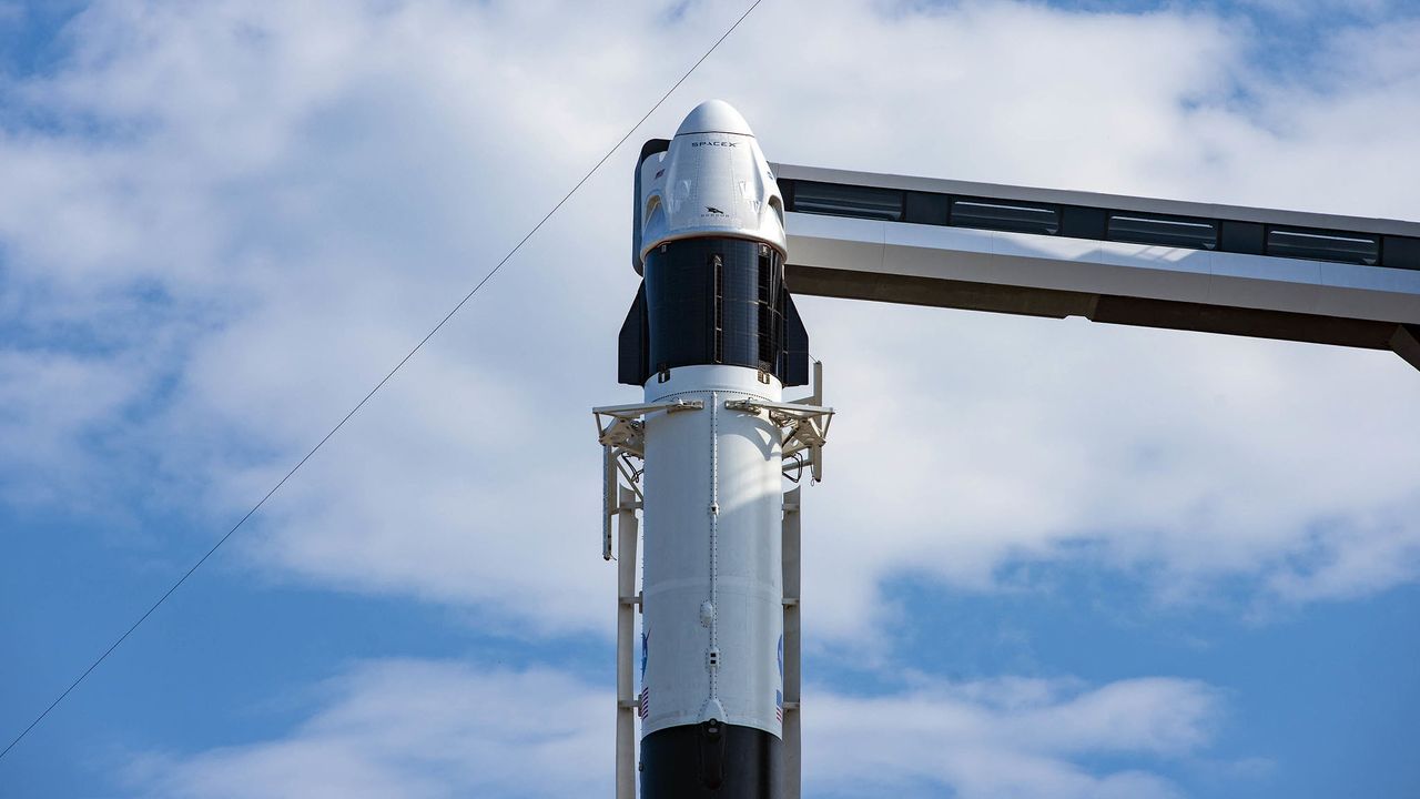 SpaceX's Crew Dragon capsule sits ready for launch atop a Falcon 9 rocket on Launch Complex 39A at NASA's Kennedy Space Center in Florida. On Wednesday (May 27), two NASA astronauts will launch to the International Space Station for the first crewed test flight of a Crew Dragon spacecraft. The Crew Dragon and Falcon 9 rocket reached the launch site on Thursday (May 21).