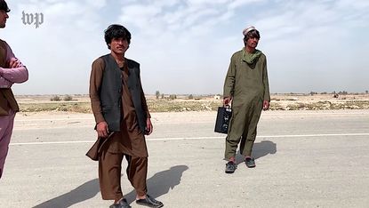 Afghan pro-government militia members