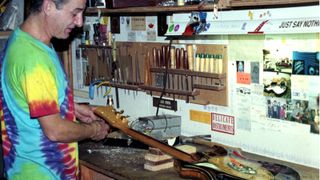 Doug Irwin working on Jerry Garcia's Tiger guitar in 1990