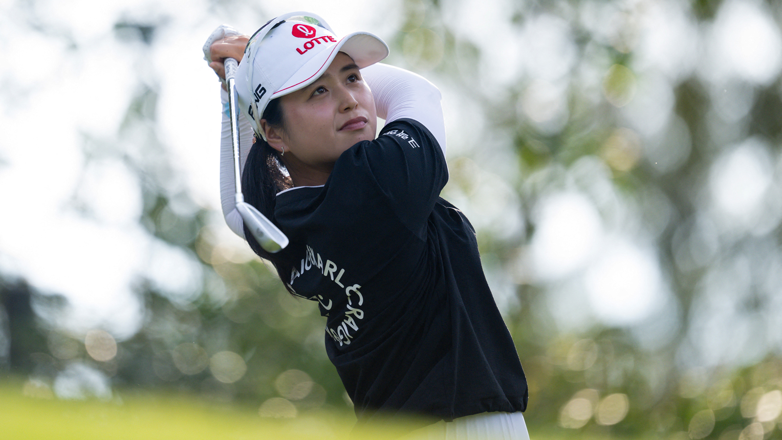 Hye-Jin Choi watches a shot into the green