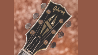 Th head of a Gibson ES-355 guitar