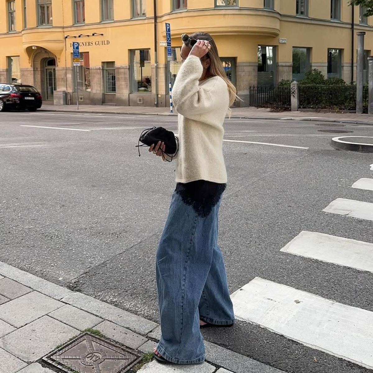 woman wearing chic fall 2025 denim trends