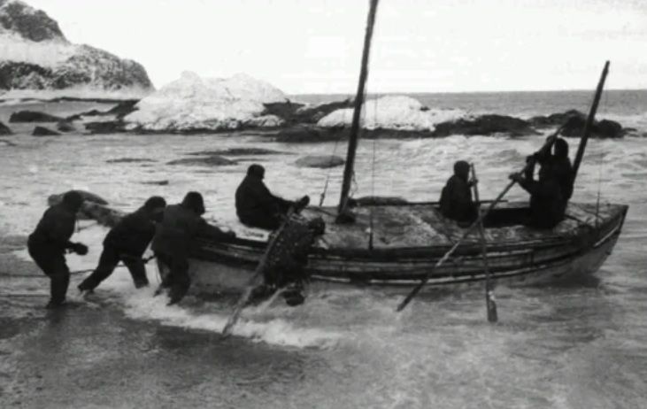 Legendary explorer Ernest Shackleton and his men boarding the boat that would take them to South Georgia. 