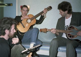 Paul Weller and Bob Geldof playing guitars at Basing St Studios on the day 'Do They Know its Christmas' is recorded for Band Aid, November 26th 1984.