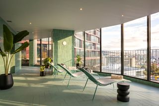 EPIQ residential building, apartment terrace with loungers