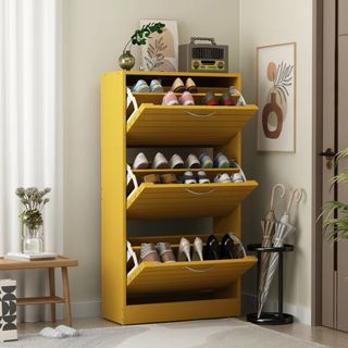 Yellow shoe storage shelf open with shoes visible