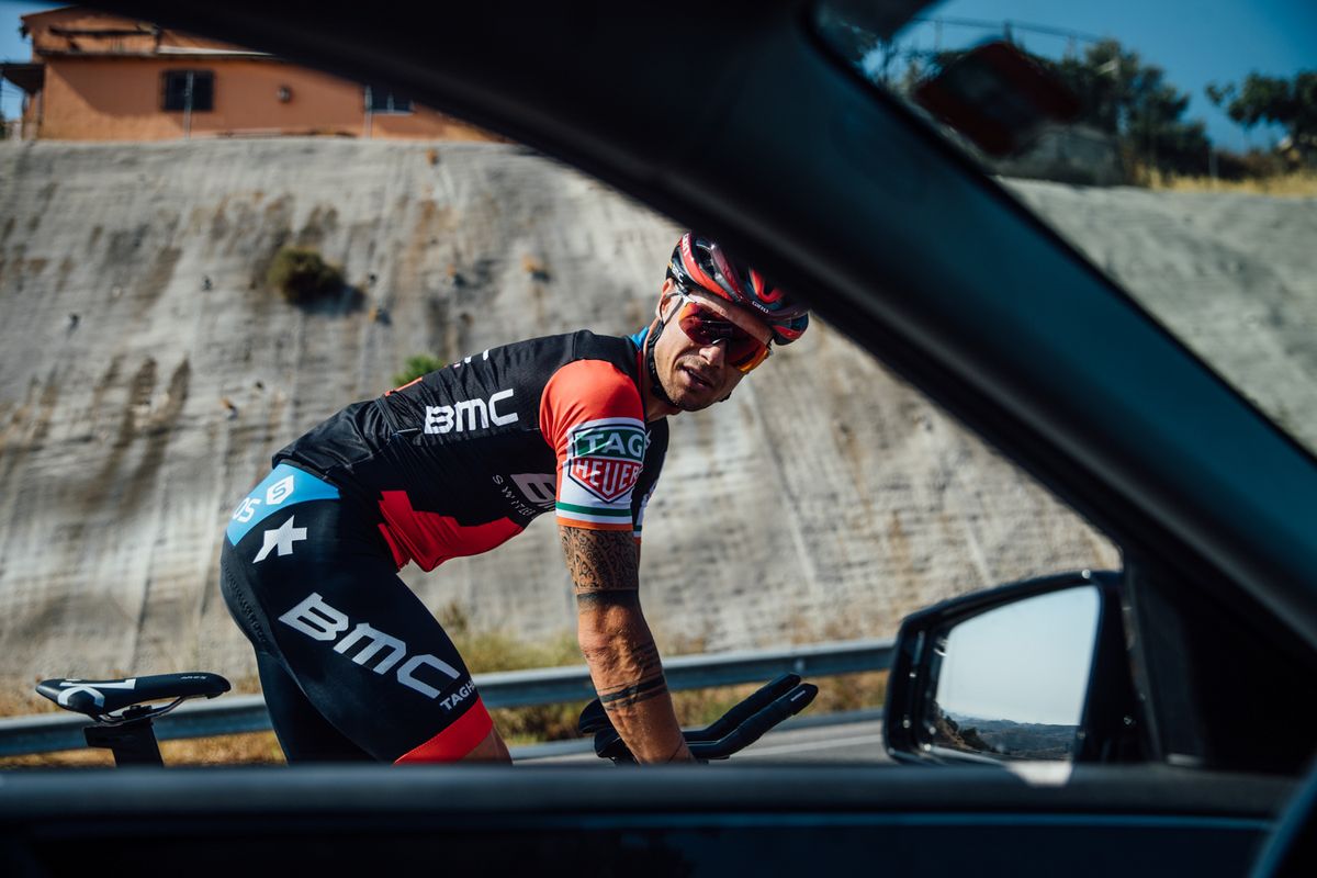 Nicolas Roche chats to soigneur Yuri Feijtel on training ride.