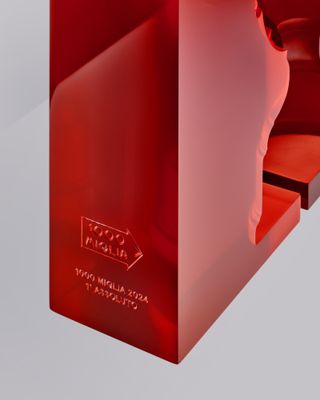Detail of a corner of the red trophy for Mille Miglia 2024