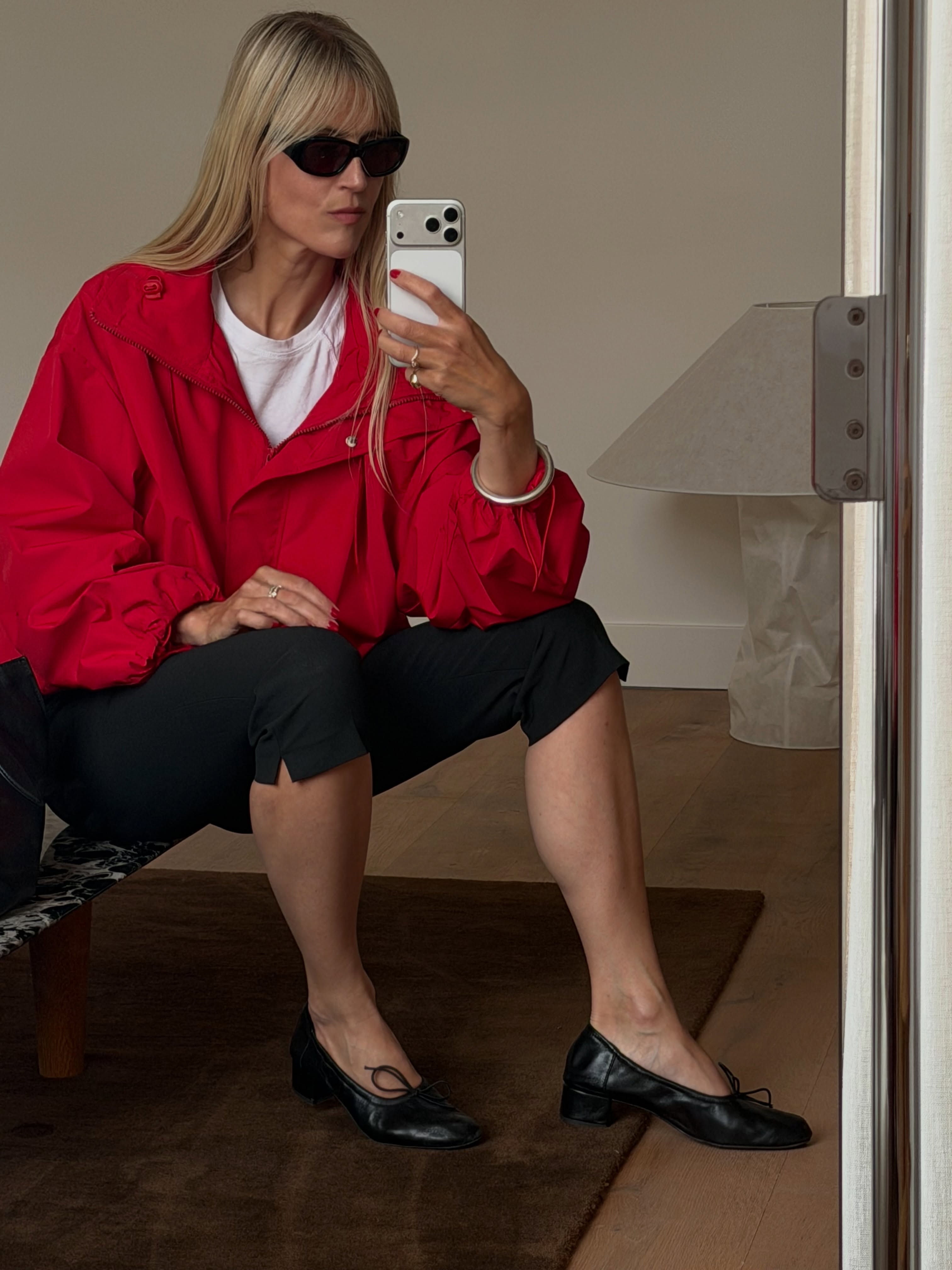 A woman wearing fall shoes with capri pants in 2026.