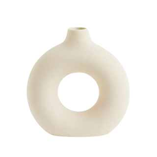 circular white ceramic vase