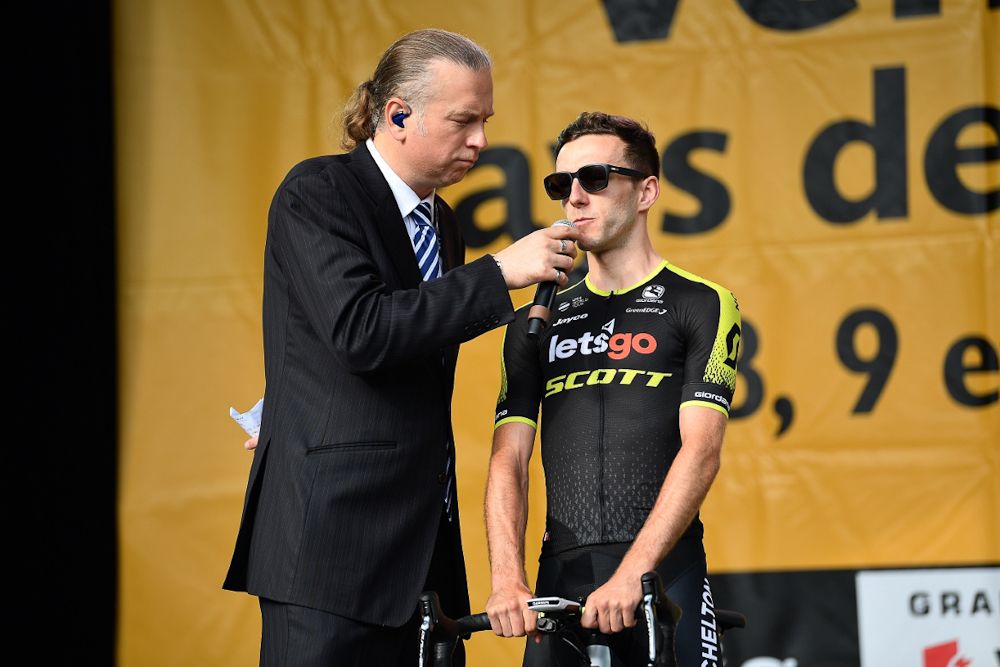 Adam Yates addresses the crowd at the 2018 Tour de France team presentation