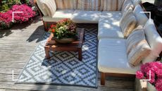 picture of outdoor rug with garden furniture around it 