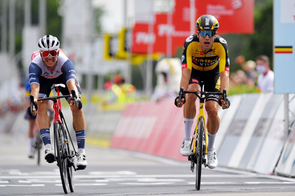 WAREGEM BELGIUM JUNE 20 Edward Theuns of Belgium Wout Van Aert of Belgium sprint at arrival during the 122th Belgian Road Championship 2021 Mens Road Race a 2213km one day race from Waregem to Waregem BELCycling belgiancycling on June 20 2021 in Waregem Belgium Photo by Luc ClaessenGetty Images
